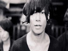 a man with a black shirt 